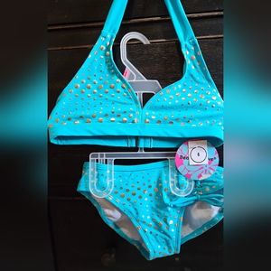 2 piece bathing suit. Super cute. Never worn with tags